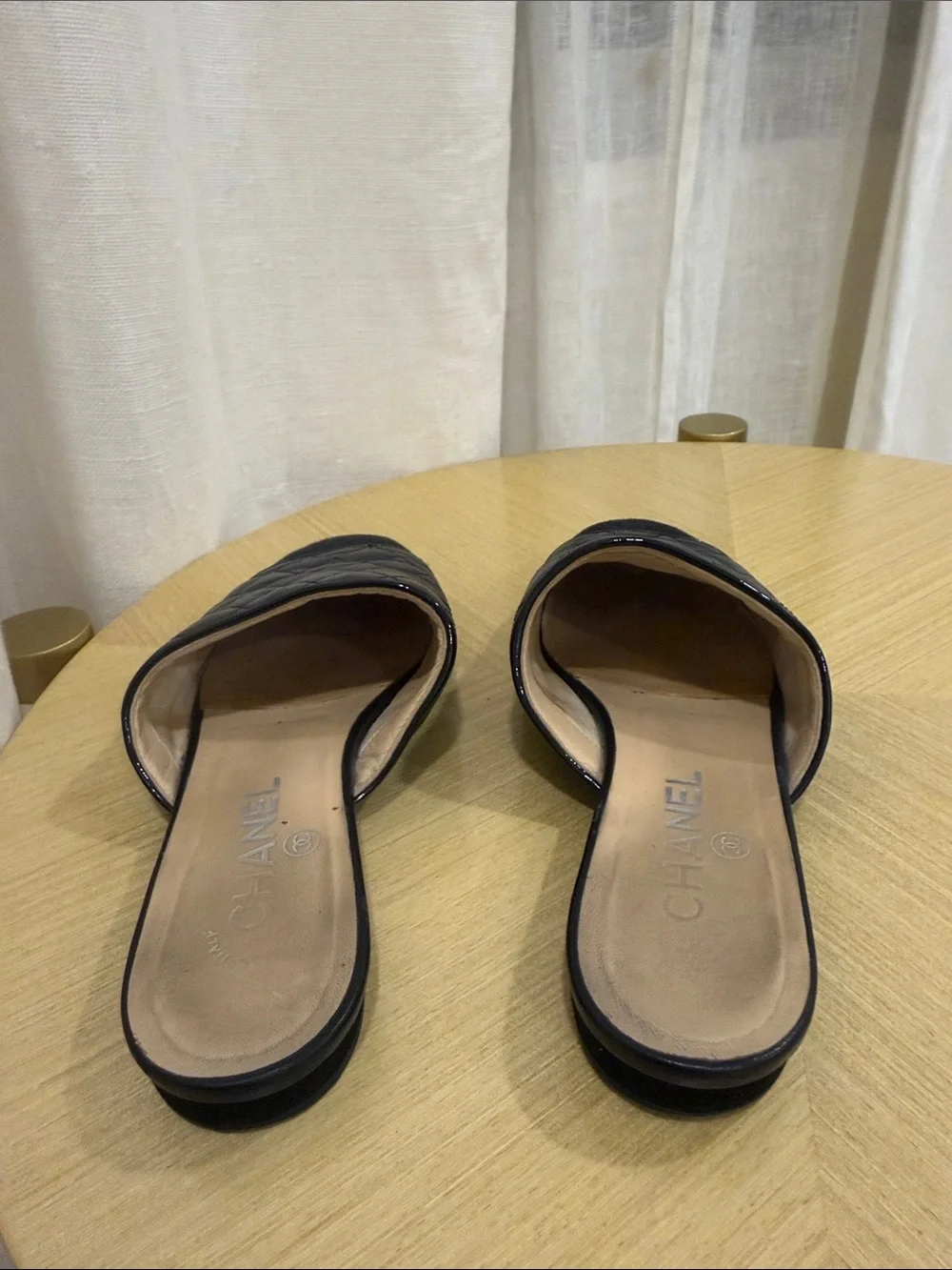 CHANEL Black Quilted Leather Slide Mules
